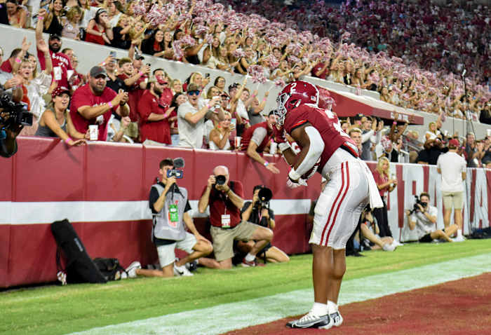 Alabama Crimson Tide running back Jase McClellan (2) celebrates with fans after scoring a touchdown against the Utah State Aggies at Bryant-Denny Stadium. Alabama won 55-0.